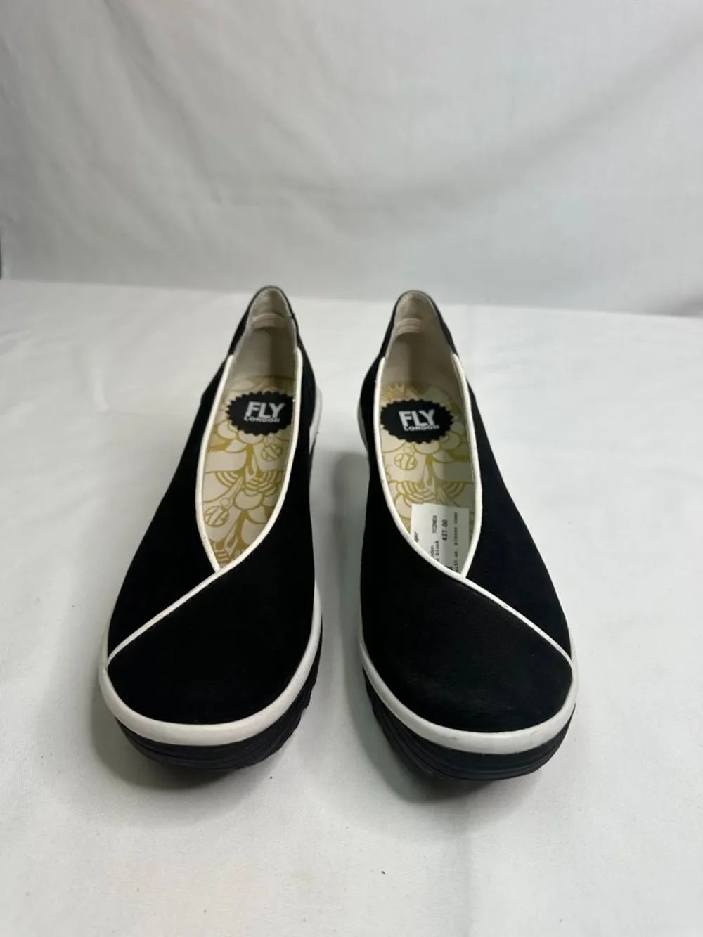 Fly London Black Slip-On Flats with White Trim